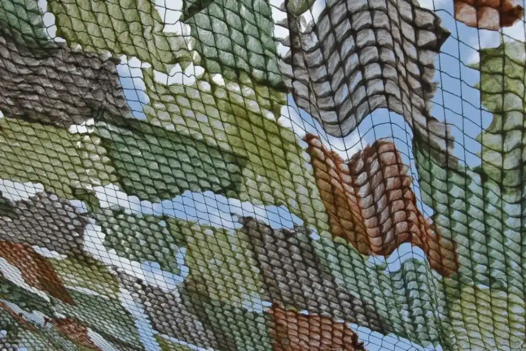 Peut-on poser un filet de camouflage sur une clôture ?